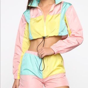 Never worn Fashion nova multi color short set